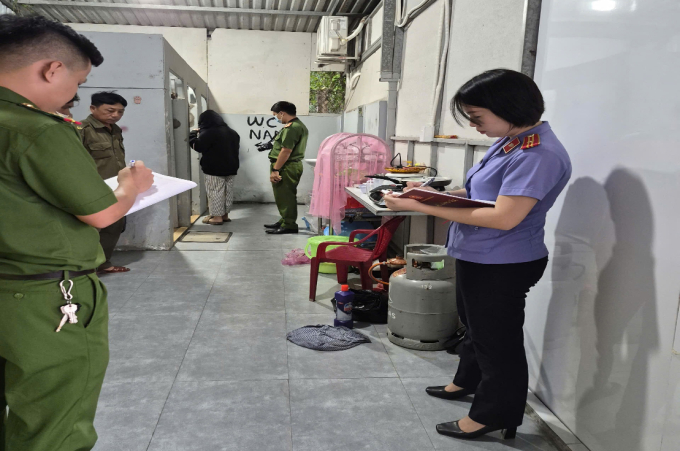 Cơ quan điều tra thực nghiệm hiện trường. Ảnh: Nam An
