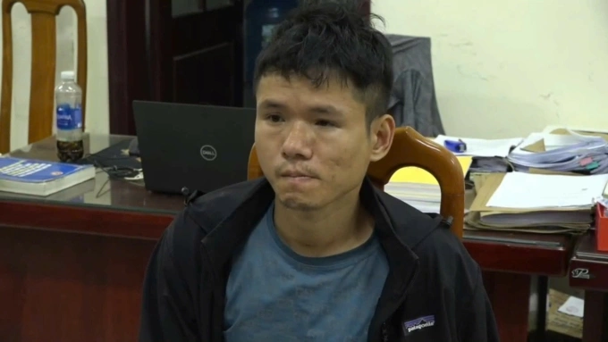 Nghi phạm Nguyễn Văn Dũng tại cơ quan điều tra. Ảnh: Anh Minh