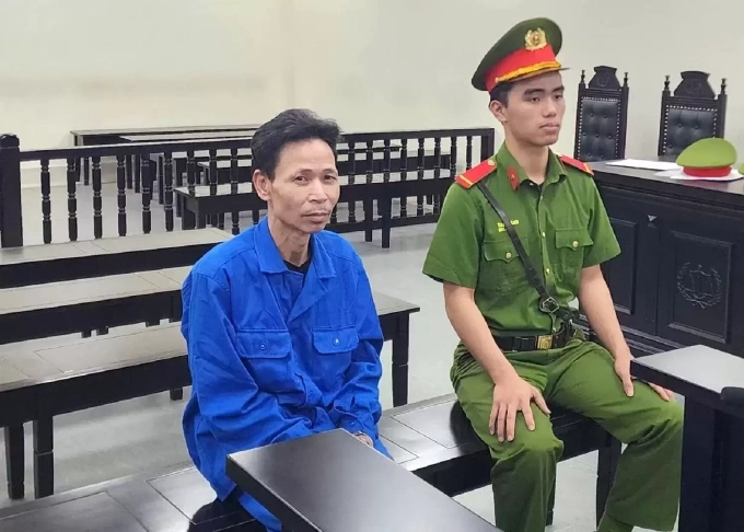 Cao Văn Hùng tại tòa ngày 24/4. Ảnh: Danh Lam