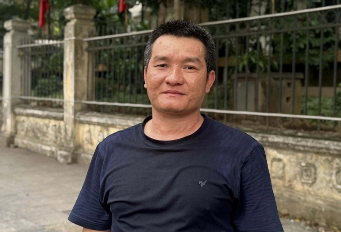 Anh Hùng ủng hộ chủ trương nhưng lo lắng về chi phí khi chuyển đổi phương tiện. Ảnh: Mộc Miên