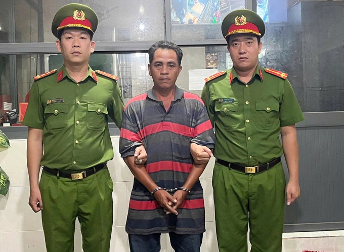 Nguyễn Minh Thành tại cơ quan điều tra. Ảnh: Công an TP HCM