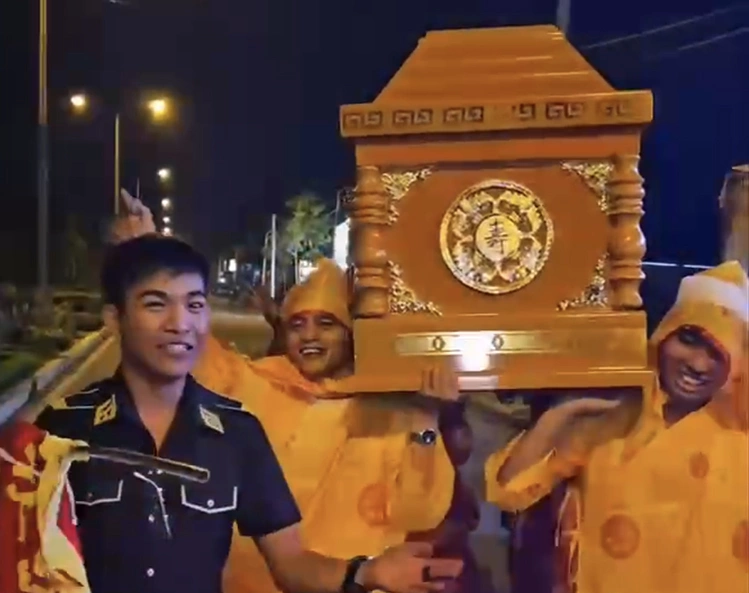 Funeral-home owner rides coffin through streets in birthday, drawing police probe