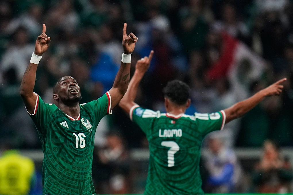 Julian Quinones (left) celebrates with Luis Romo after scoring the opening goal for Mexico against Ecuador in the round of 16 of the 2026 World Cup in Mexico City. Photo: AP