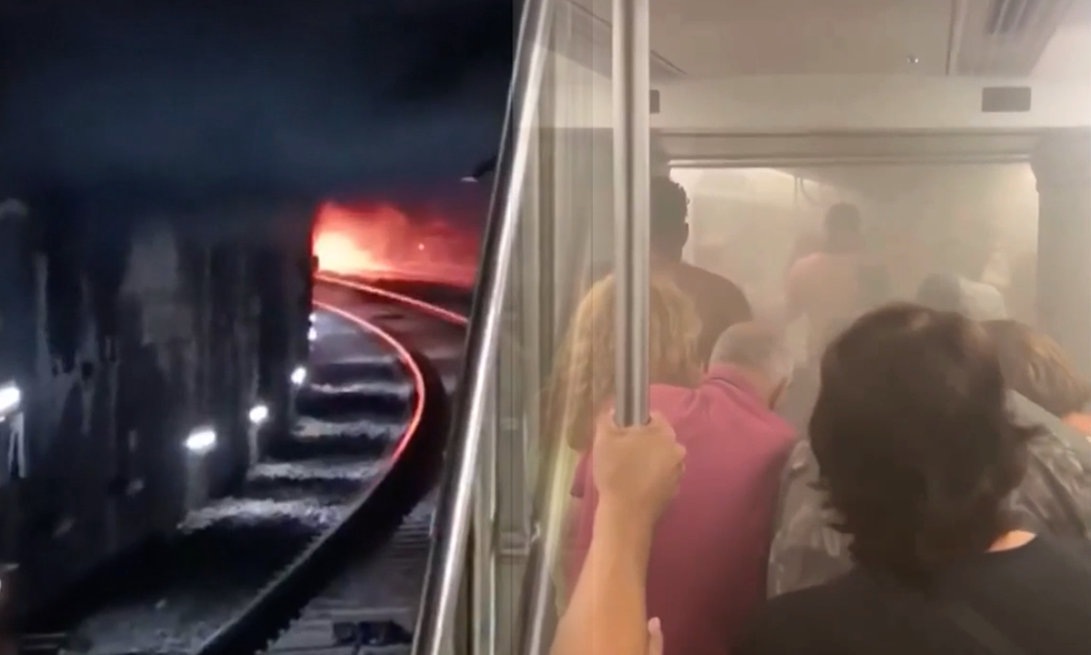 Hành khách vội sơ tán khi khói tràn vào toa tàu metro ở Barcelona