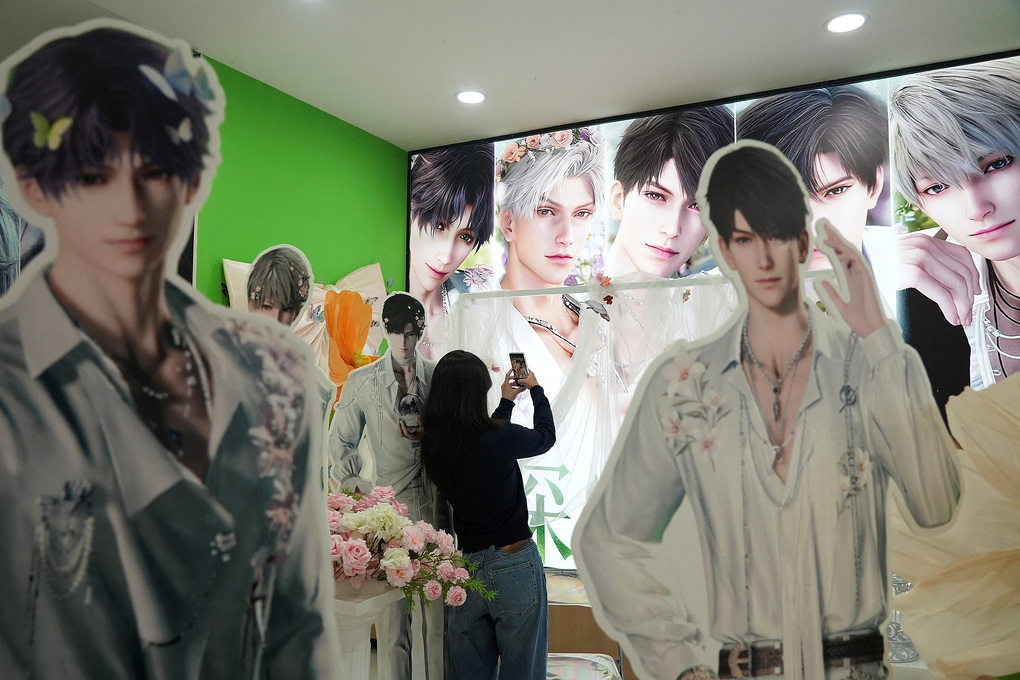 Characters in the dating game Love and Deepspace at a shopping center in Guangzhou on February 1, 2026. Photo: Reuters